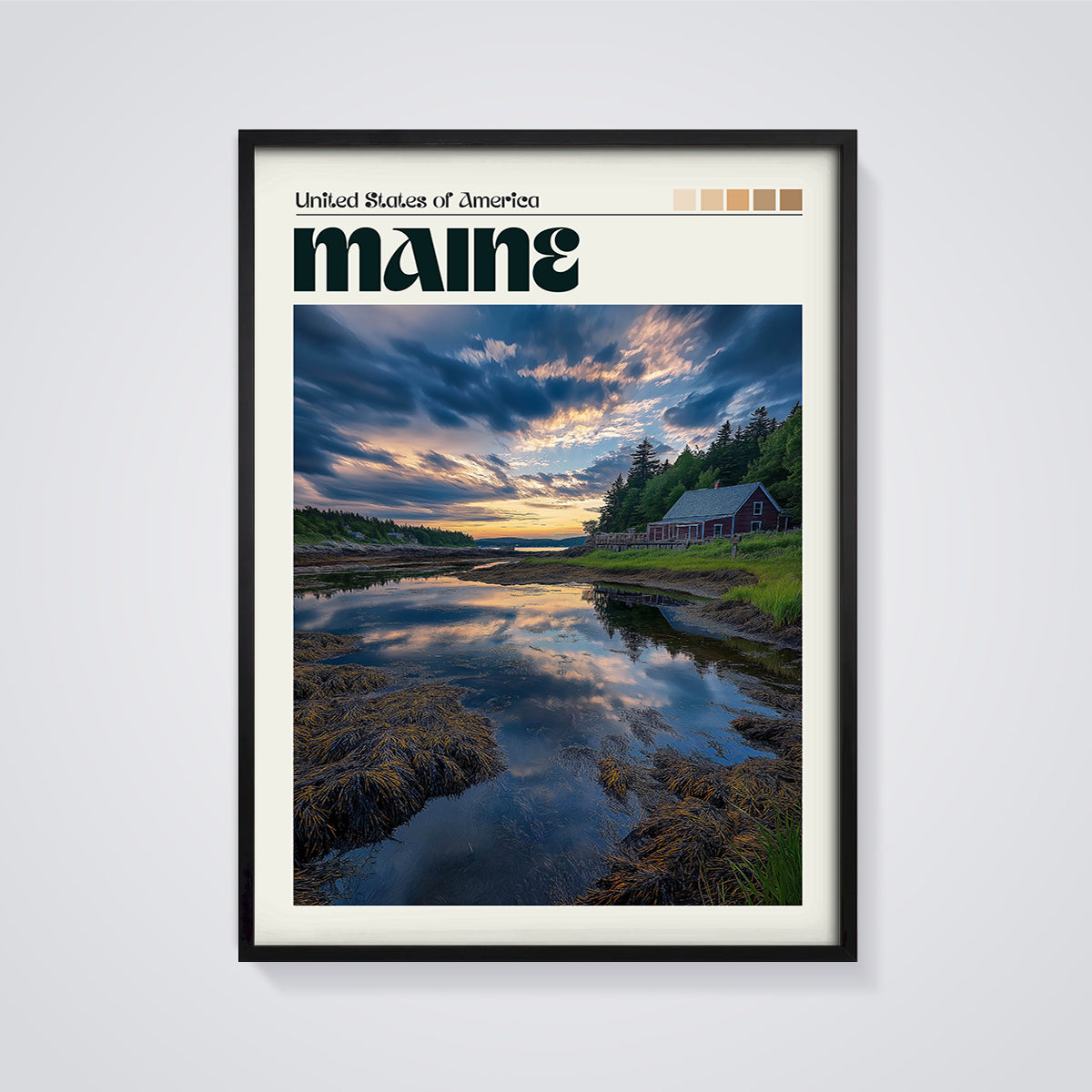 Maine Coastal House Sunset Print framed in black on a grey background