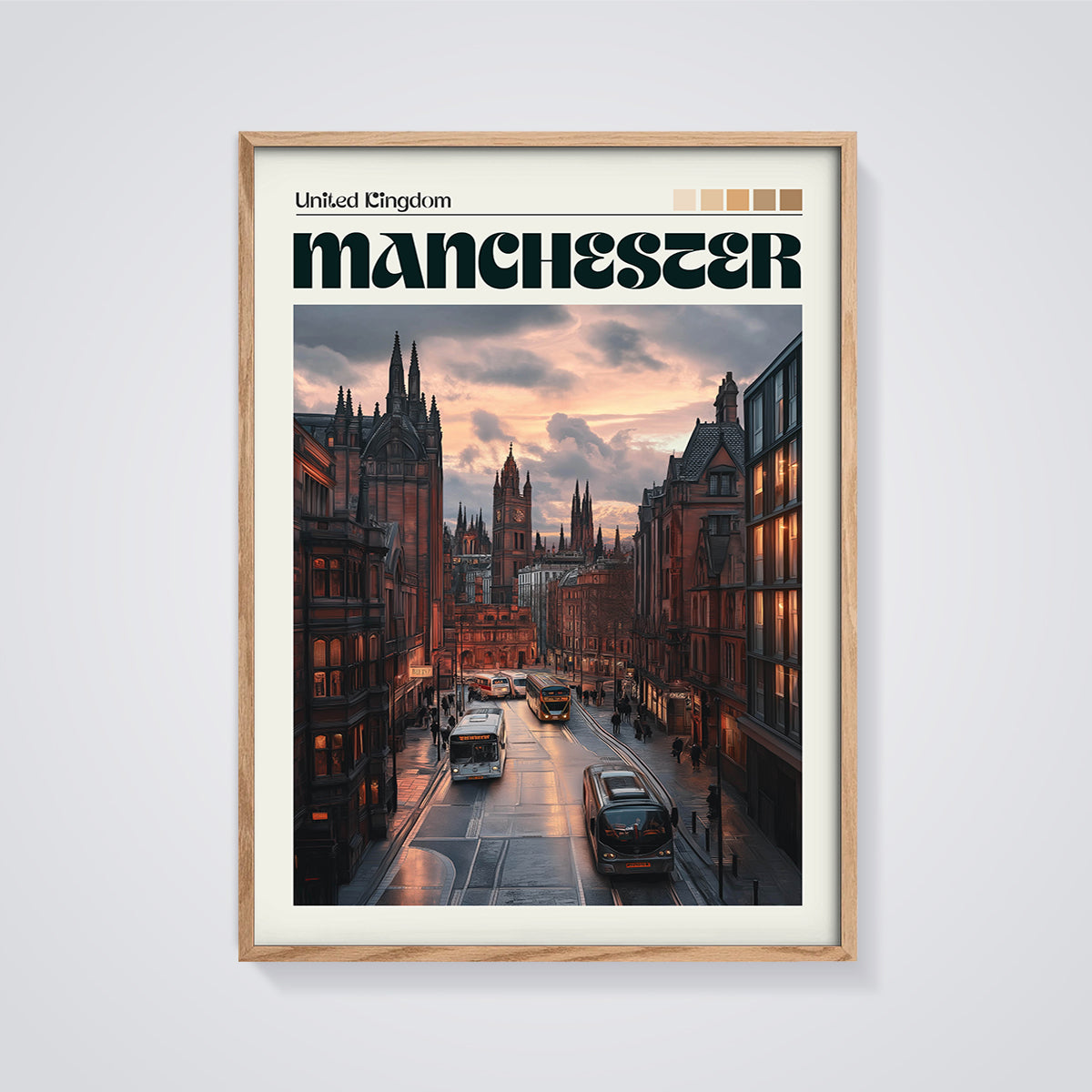 Manchester Cityscape Sunset Print framed in oak on a grey background