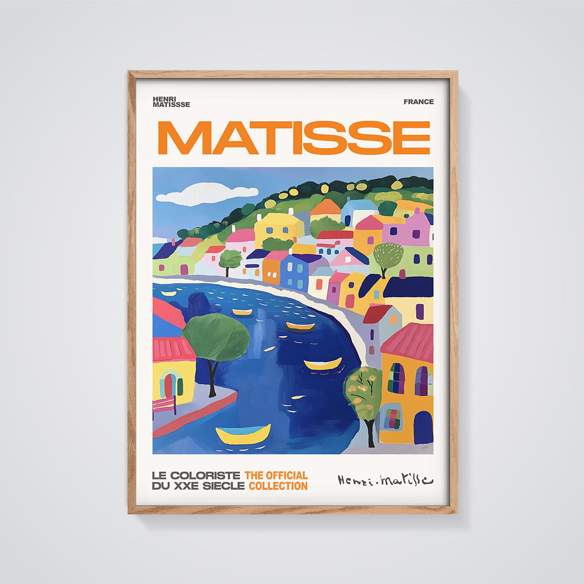 Matisse France Coastal Village Print framed in oak on a grey background