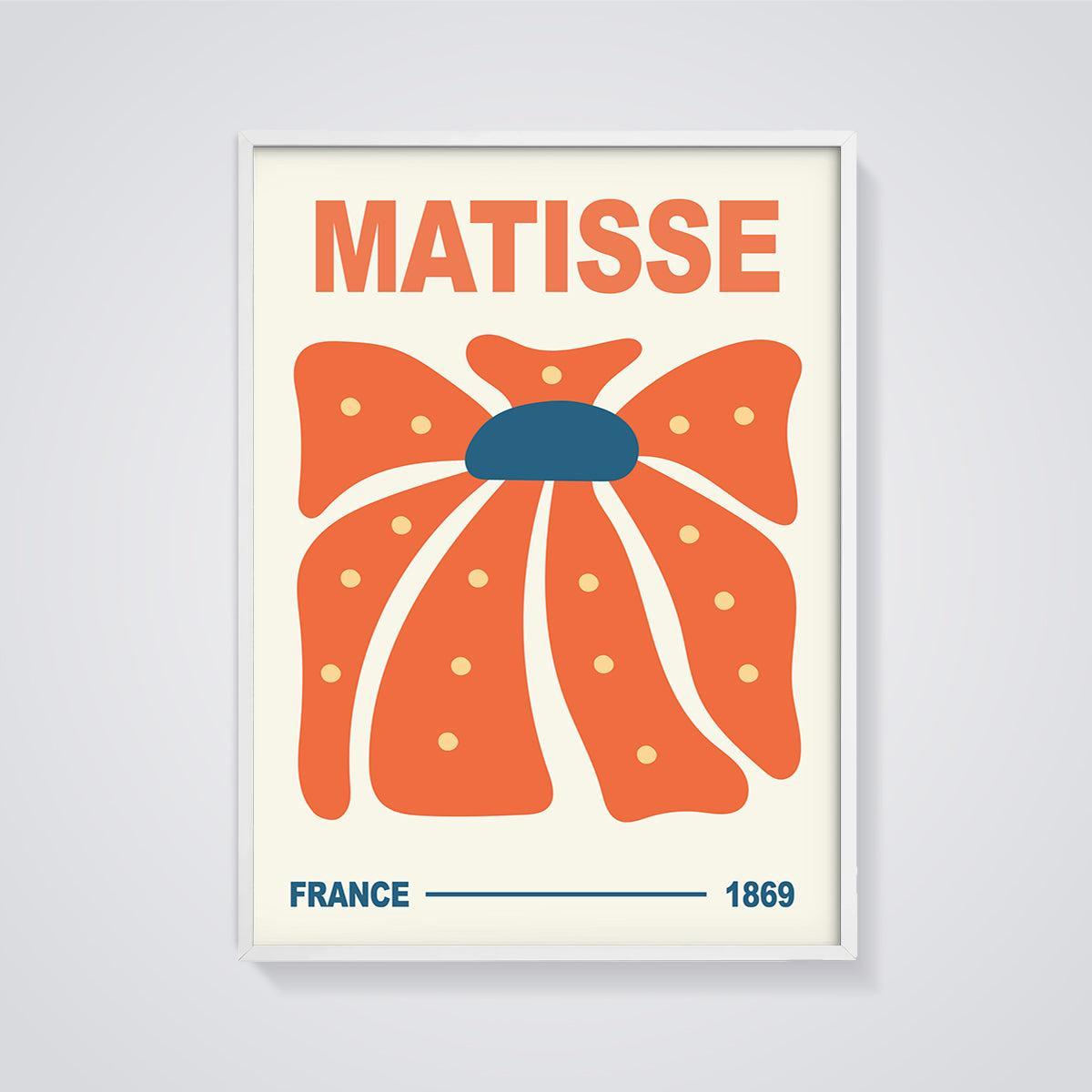 Matisse Orange Bloom Print framed in white on a grey background