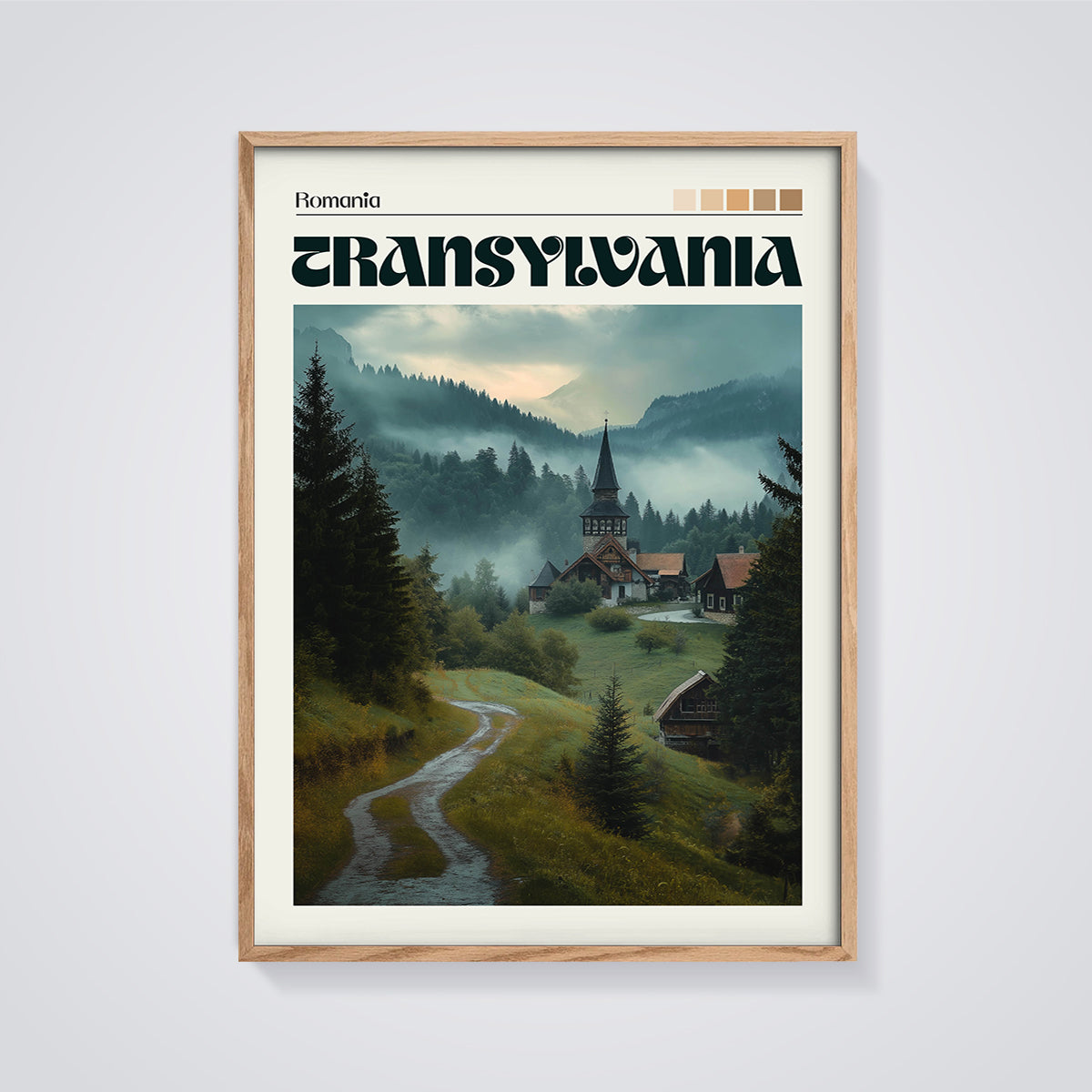 Misty Transylvania Village Print framed in oak on a grey background