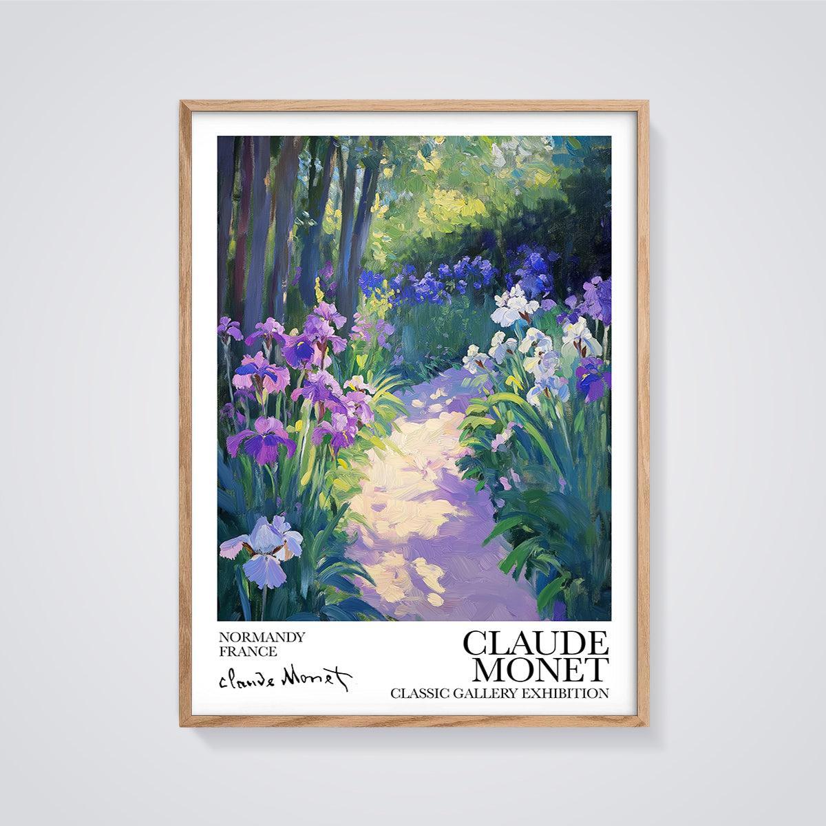 Monet's Irises Garden Path Print framed in oak on a grey background