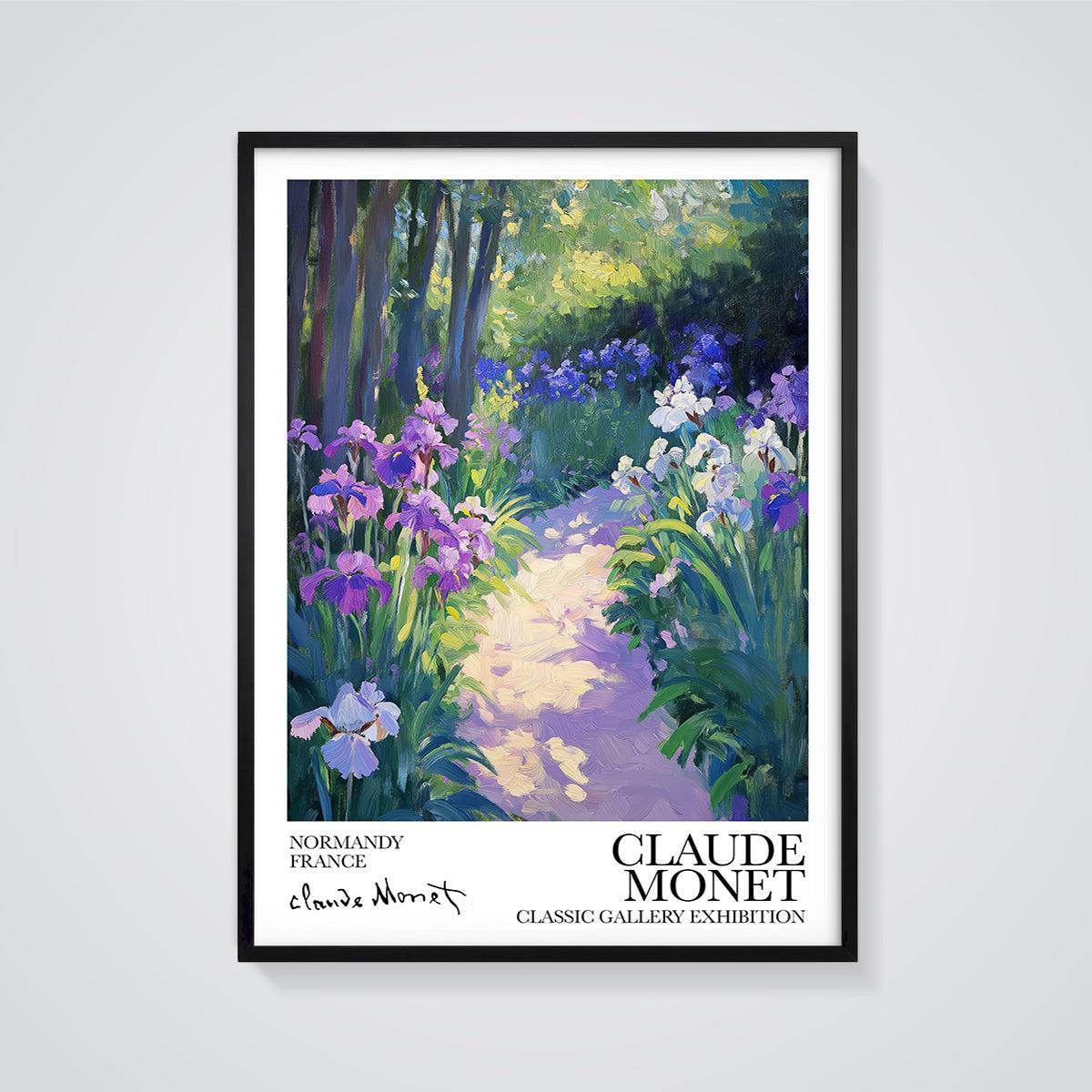 Monet's Irises Garden Path Print framed in black on a grey background