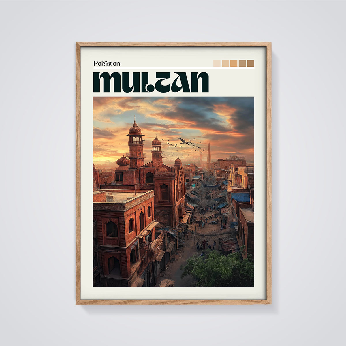 Multan Old City Sunset Print framed in oak on a grey background