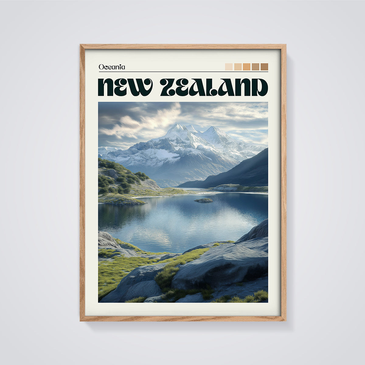 New Zealand Mountain Lake Print framed in oak on a grey background