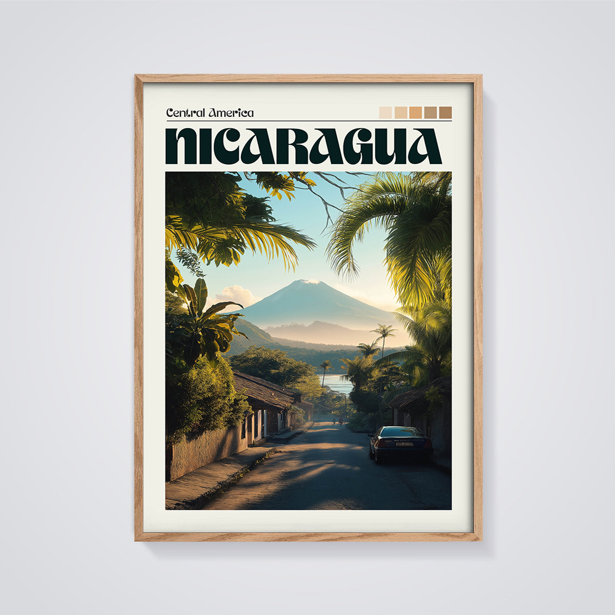 Nicaragua Volcano Village Print framed in oak on a grey background