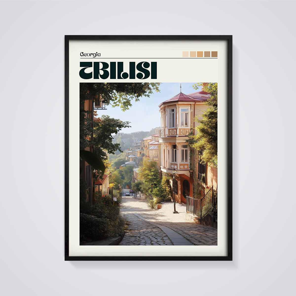 Old Tbilisi Cobblestone Street Print framed in black on a grey background