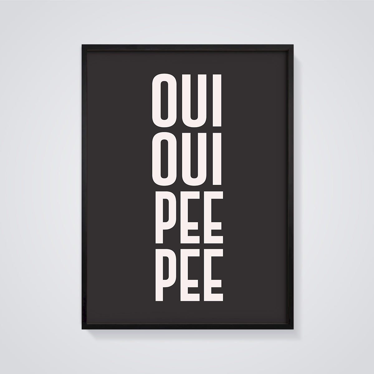 Oui Oui Pee Pee Print framed in black on a grey background
