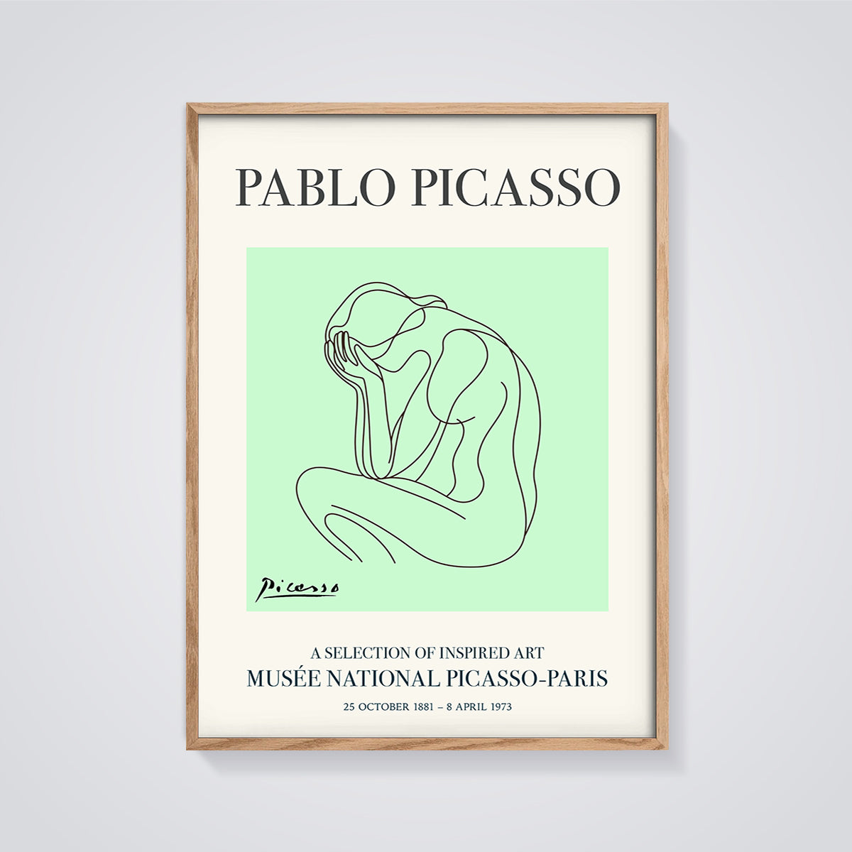 Pablo Picasso Crying Woman Print framed in oak on a grey background