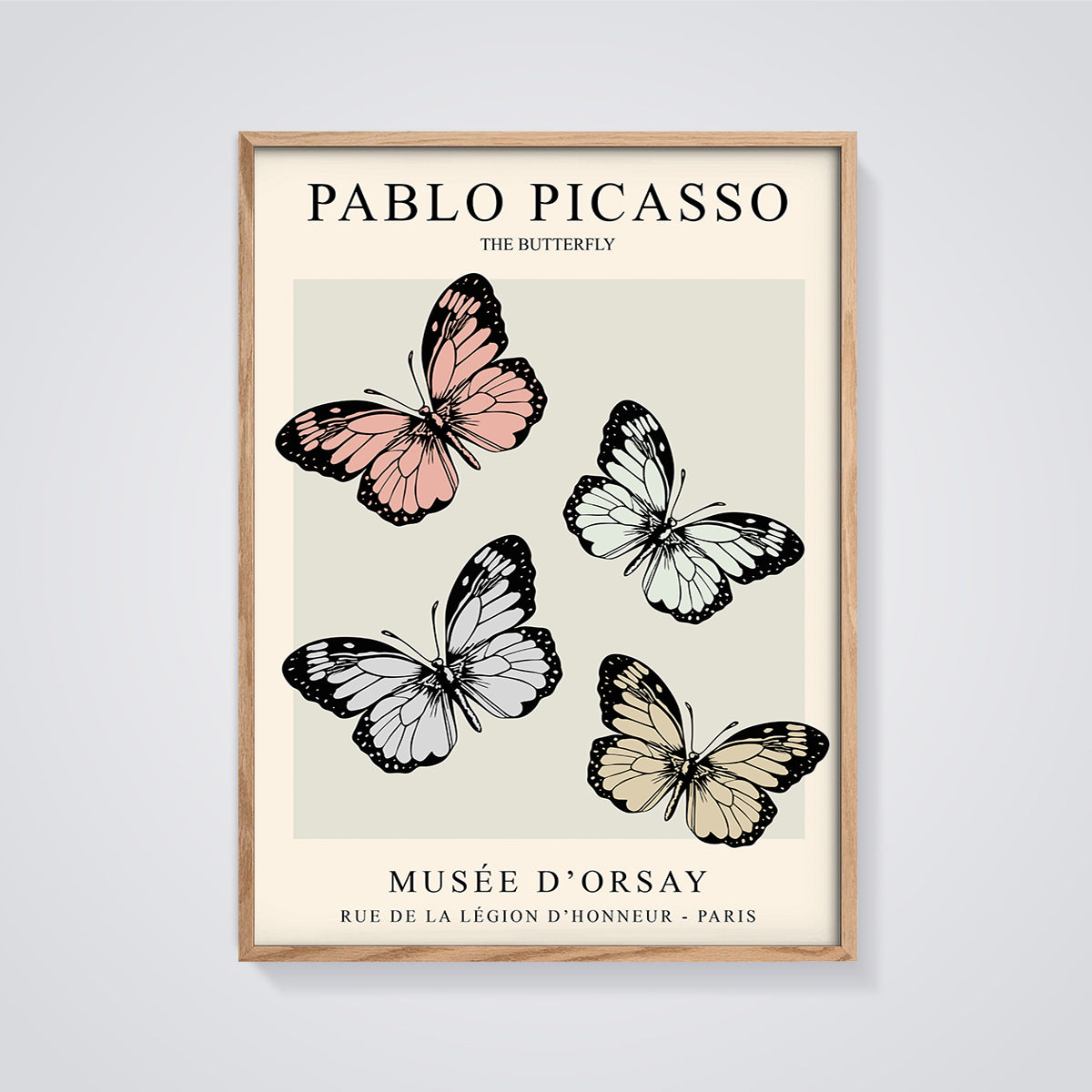 Pablo Picasso The Butterfly Print framed in oak on a grey background