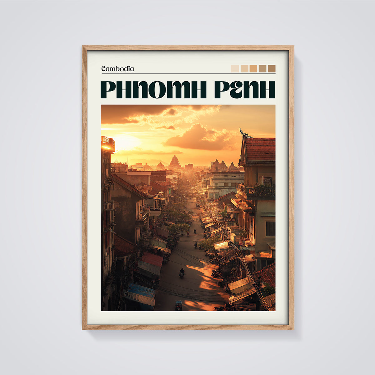 Phnom Penh Cityscape Sunset Print framed in oak on a grey background