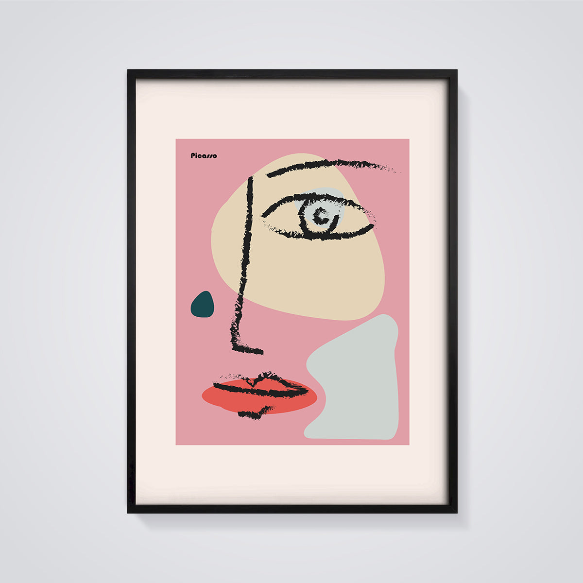 Picasso Abstract Face Print Art framed in black on a grey background