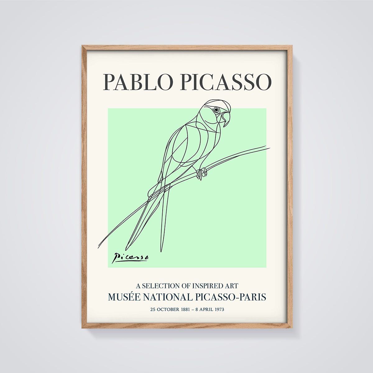 Picasso Parrot Print framed in oak on a grey background
