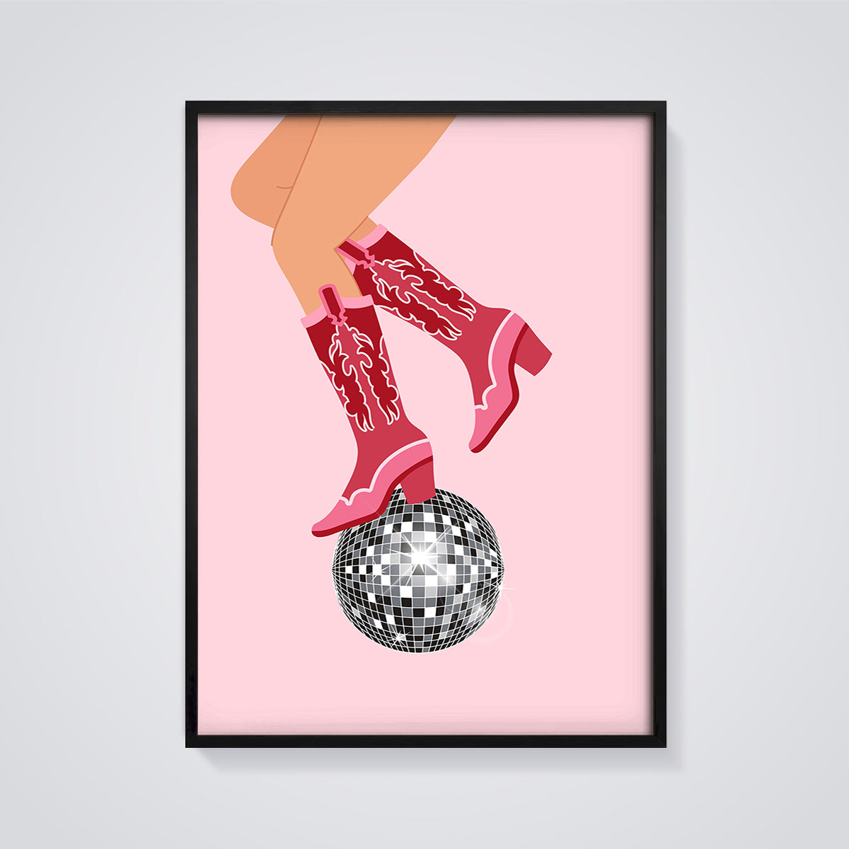 Pink Cowboy Boots Disco Print framed in black on a grey background
