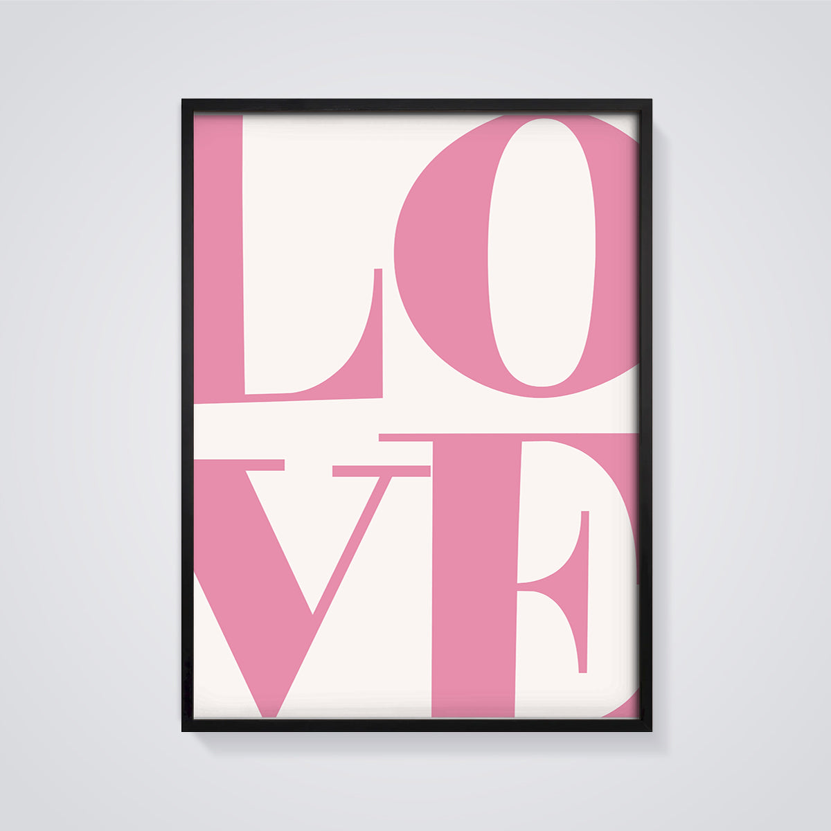 Pink LOVE Typography Print framed in black on a grey background