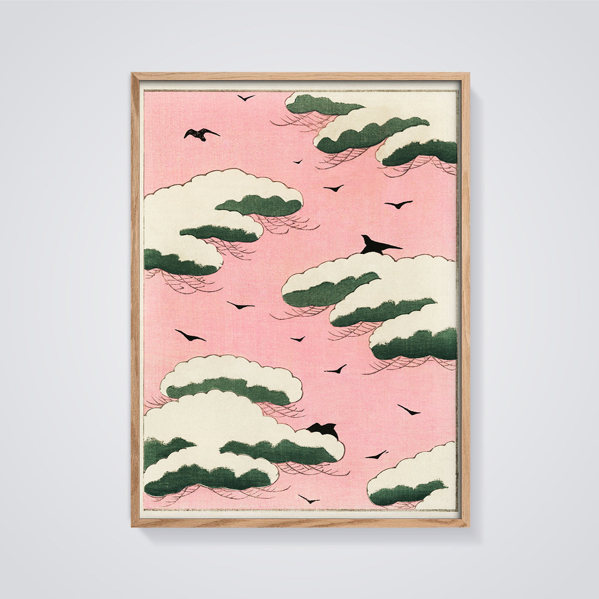Pink Sky Snow Clouds and Birds Print framed in oak on a grey background