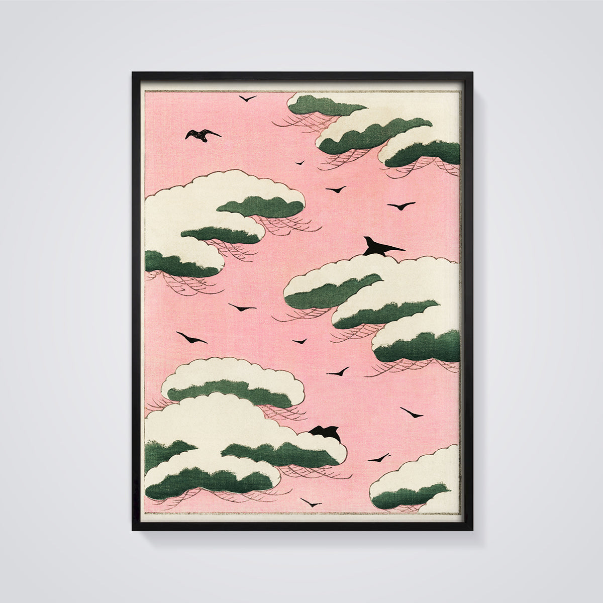 Pink Sky Snow Clouds and Birds Print framed in black on a grey background