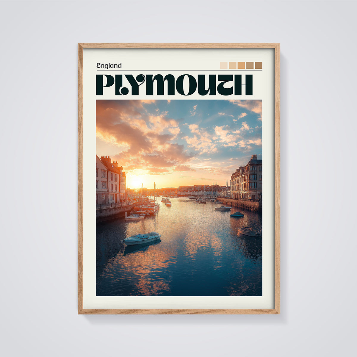 Plymouth Harbor Sunset Print framed in oak on a grey background