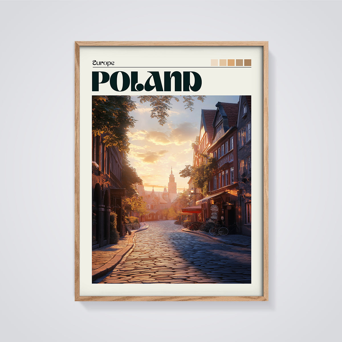 Poland Cobblestone Sunset Print framed in oak on a grey background