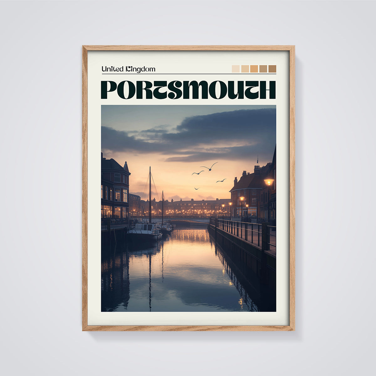 Portsmouth Waterfront Dusk Print framed in oak on a grey background