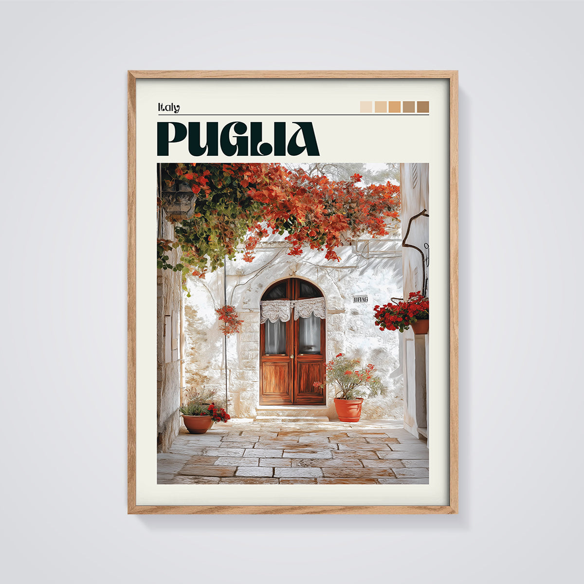 Puglia White Wall Alley Print framed in oak on a grey background