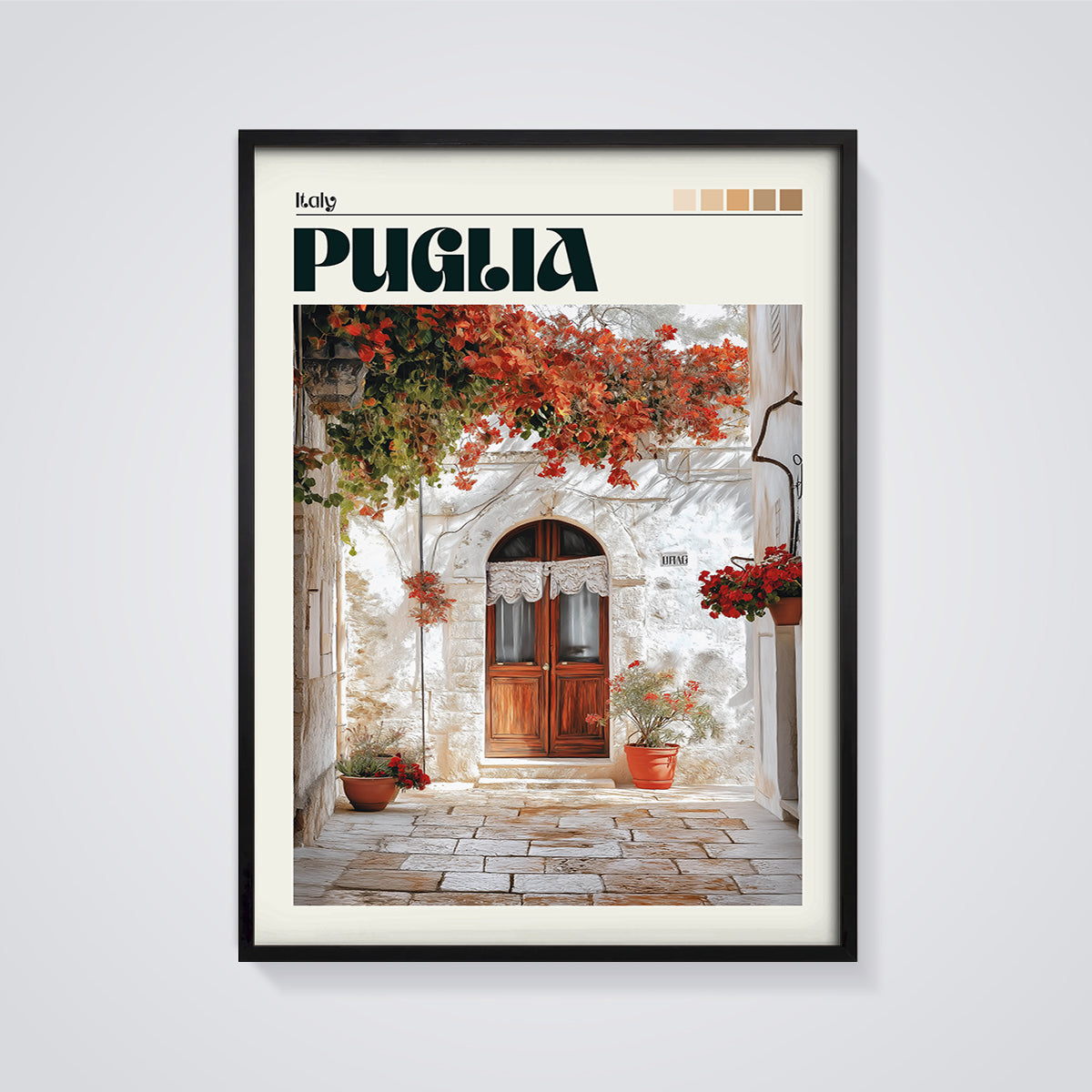 Puglia White Wall Alley Print framed in black on a grey background