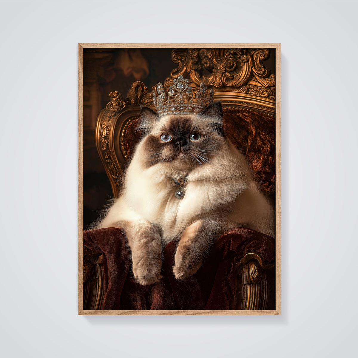 Queen Cat Portrait Print framed in oak on a grey background