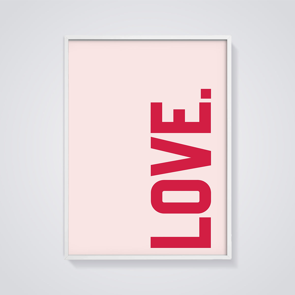 Red LOVE Typography Print framed in white on a grey background