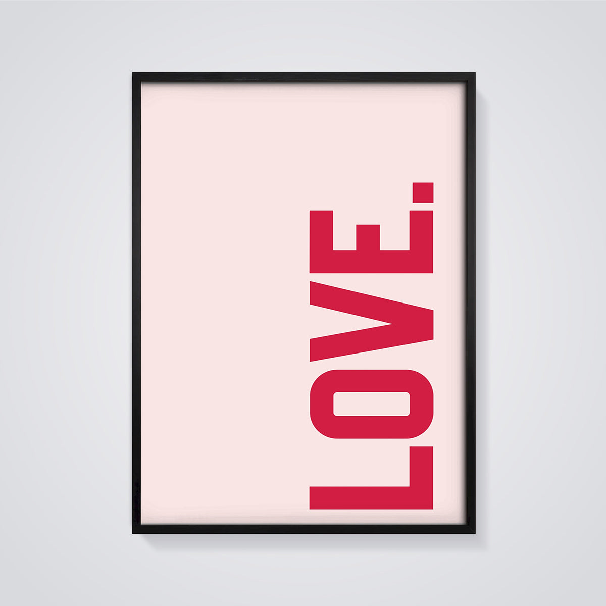 Red LOVE Typography Print framed in black on a grey background