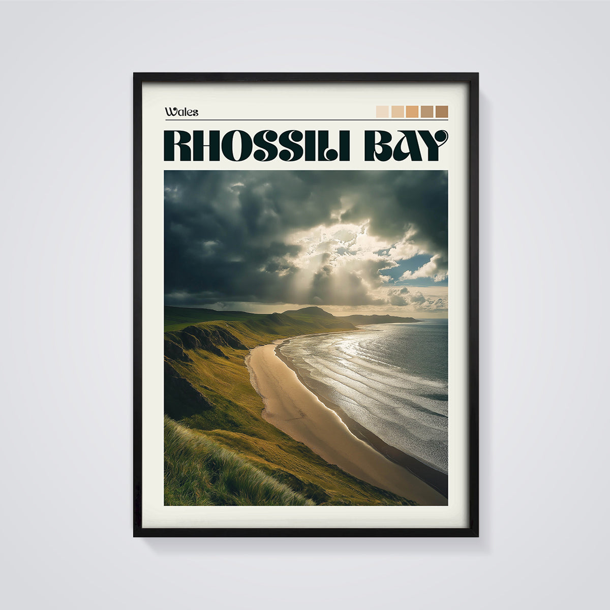 Rhossili Bay Sun Rays Print framed in black on a grey background