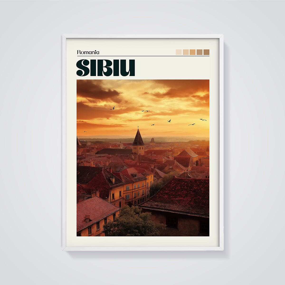 Sibiu Rooftops Sunset Print framed in white on a grey background