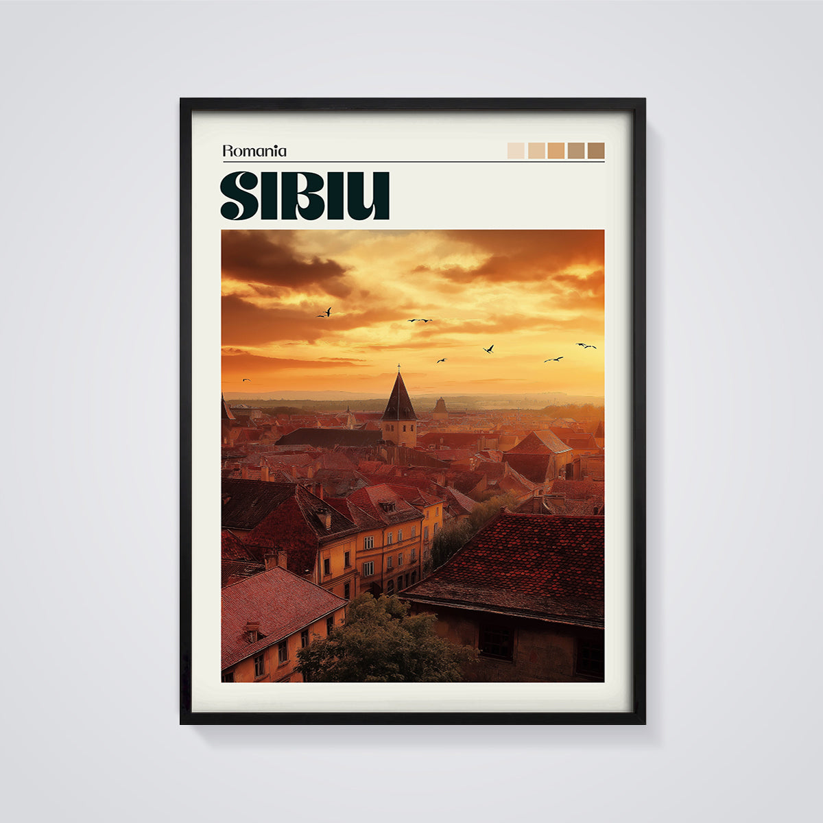 Sibiu Rooftops Sunset Print framed in black on a grey background