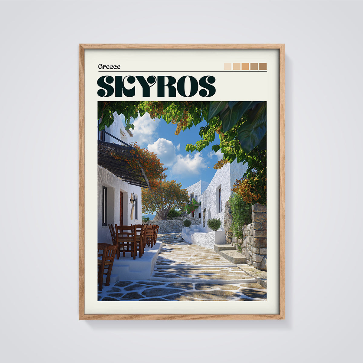 Skyros Village Alley Print framed in oak on a grey background