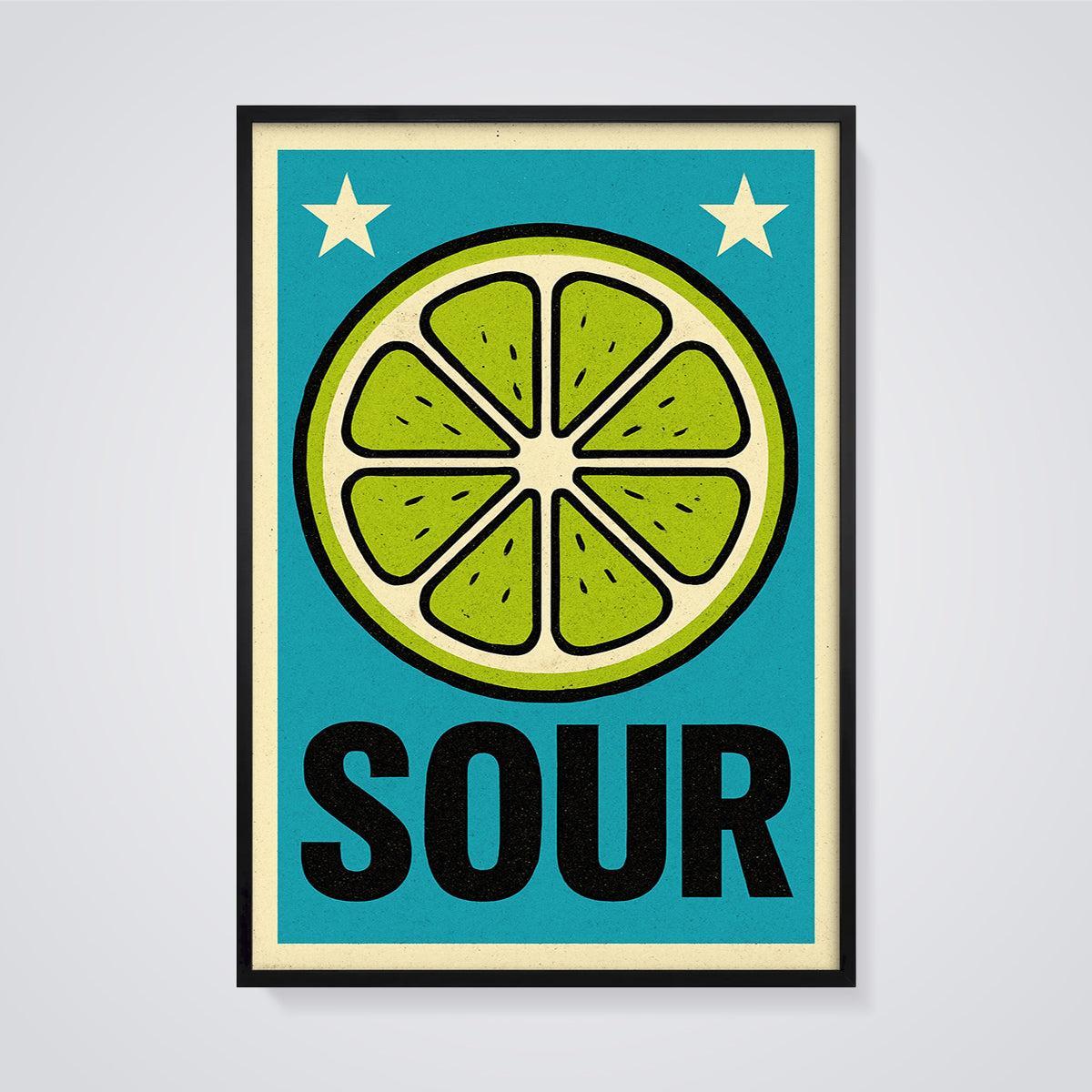Sour Lime Slice Print framed in black on a grey background