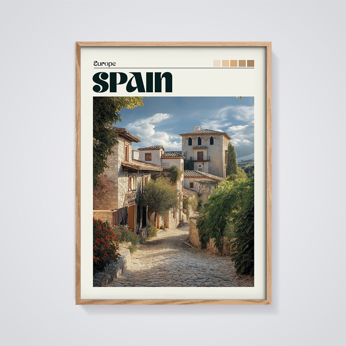 Spain Old Town Street Print framed in oak on a grey background