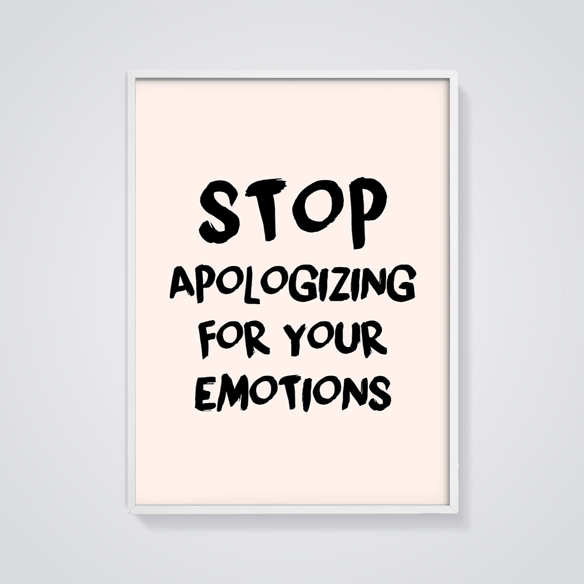 Stop Apologizing Emotions Print framed in white on a grey background