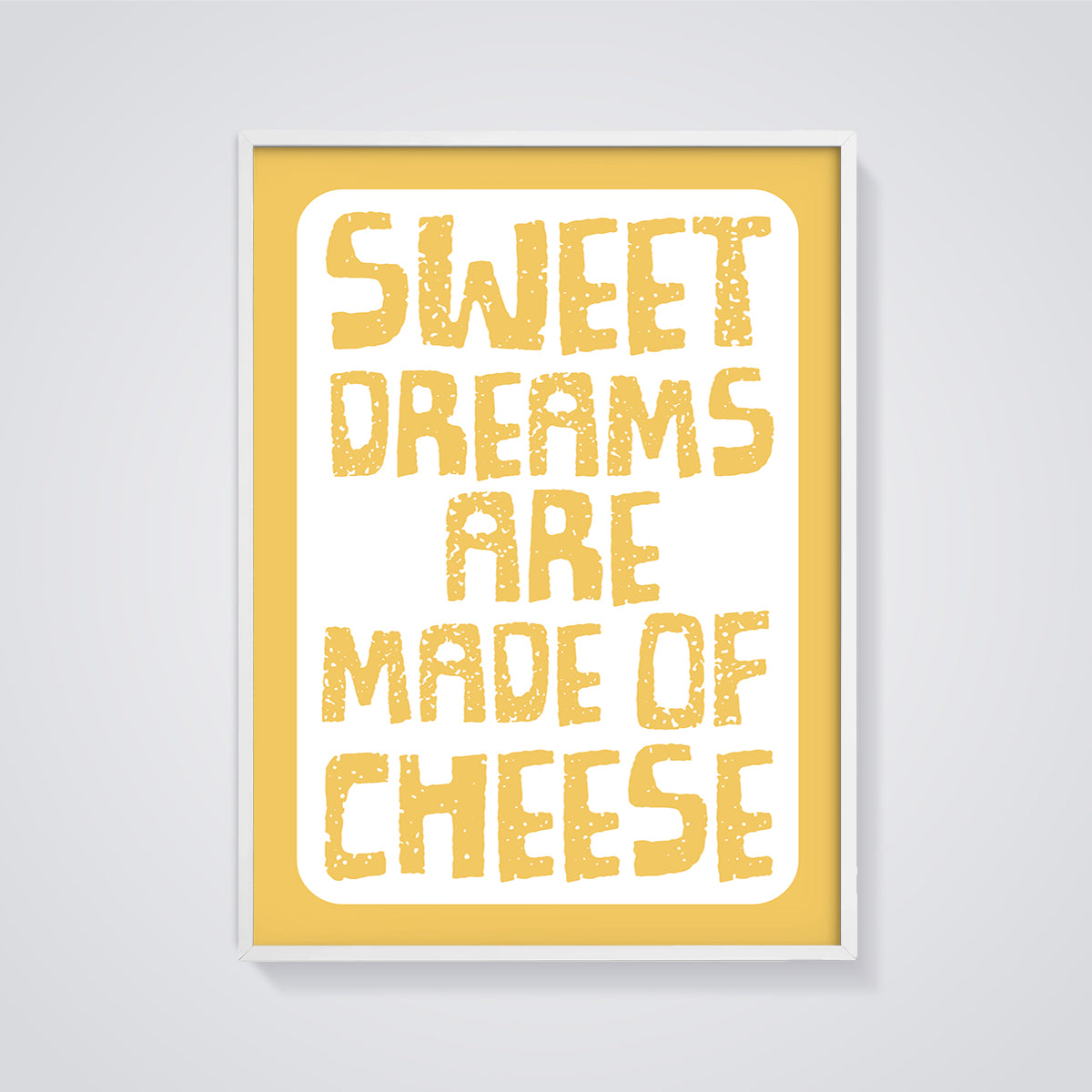 Sweet Dreams Are Made of Cheese Print framed in white on a grey background