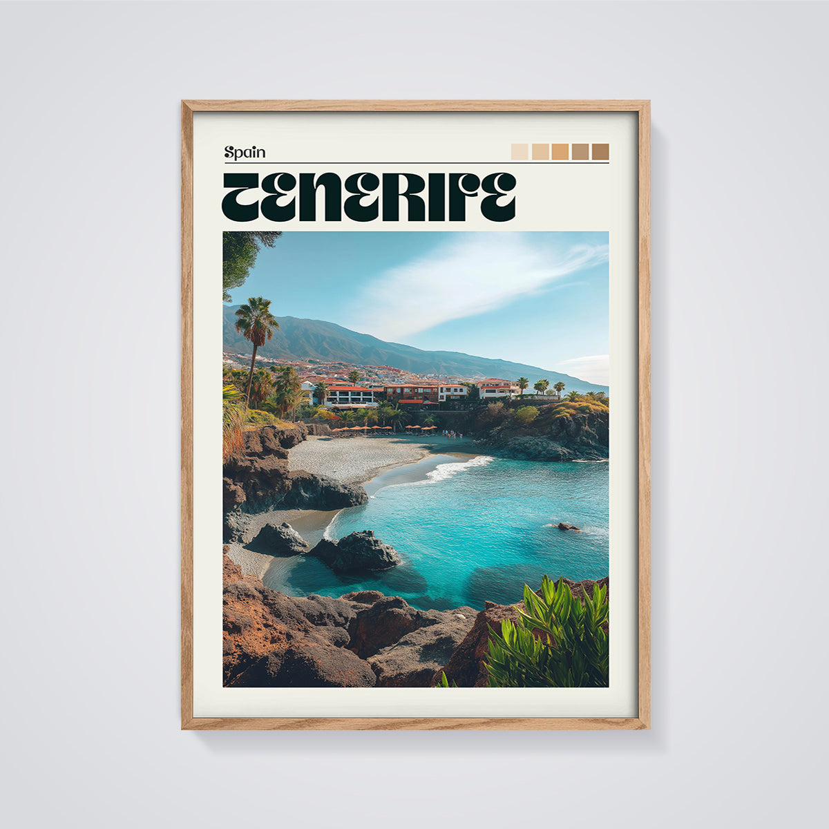 Tenerife Coastal Cove Print framed in oak on a grey background