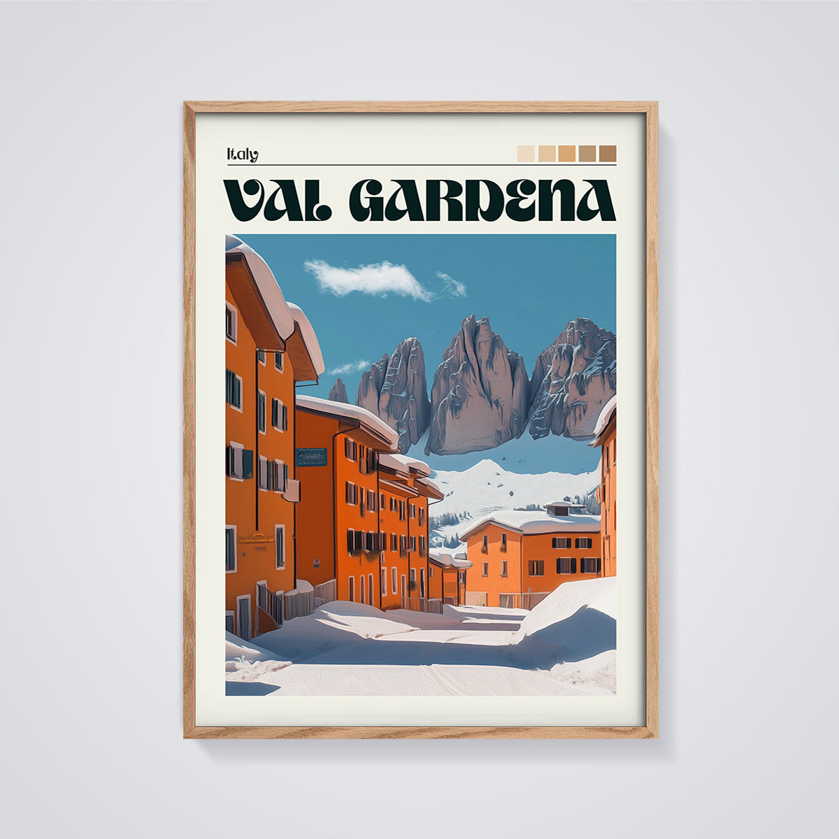 Val Gardena Winter Village Print framed in oak on a grey background
