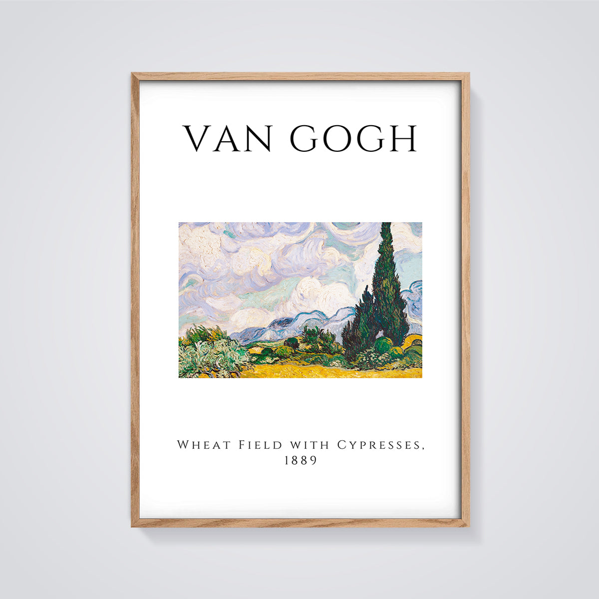 Van Gogh Wheat Field with Cypresses Print framed in oak on a grey background