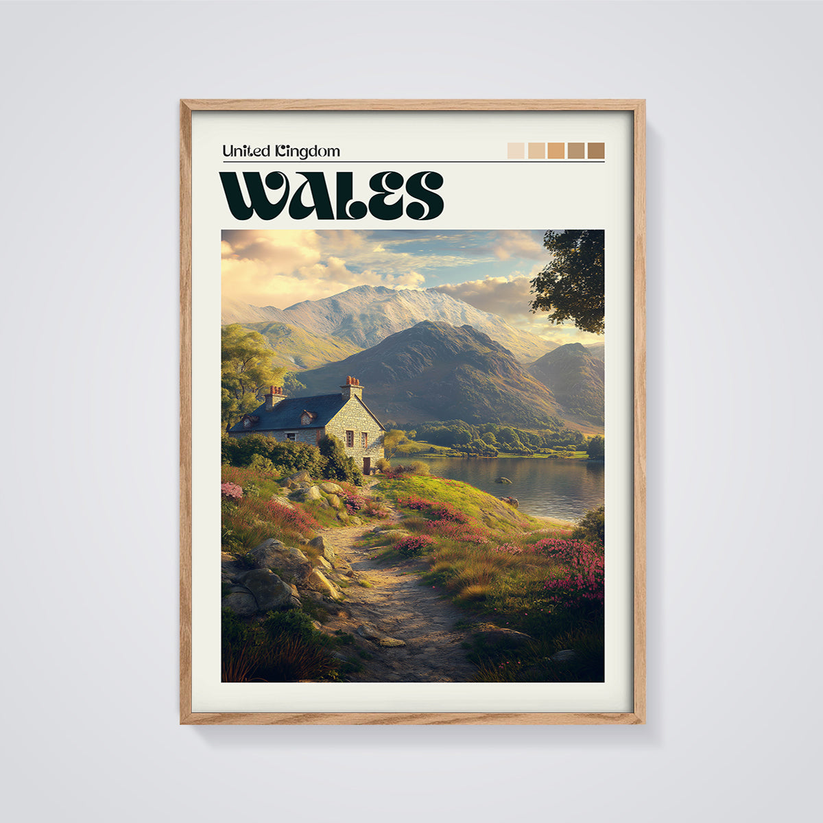 Wales Mountain Lake Cottage Print framed in oak on a grey background