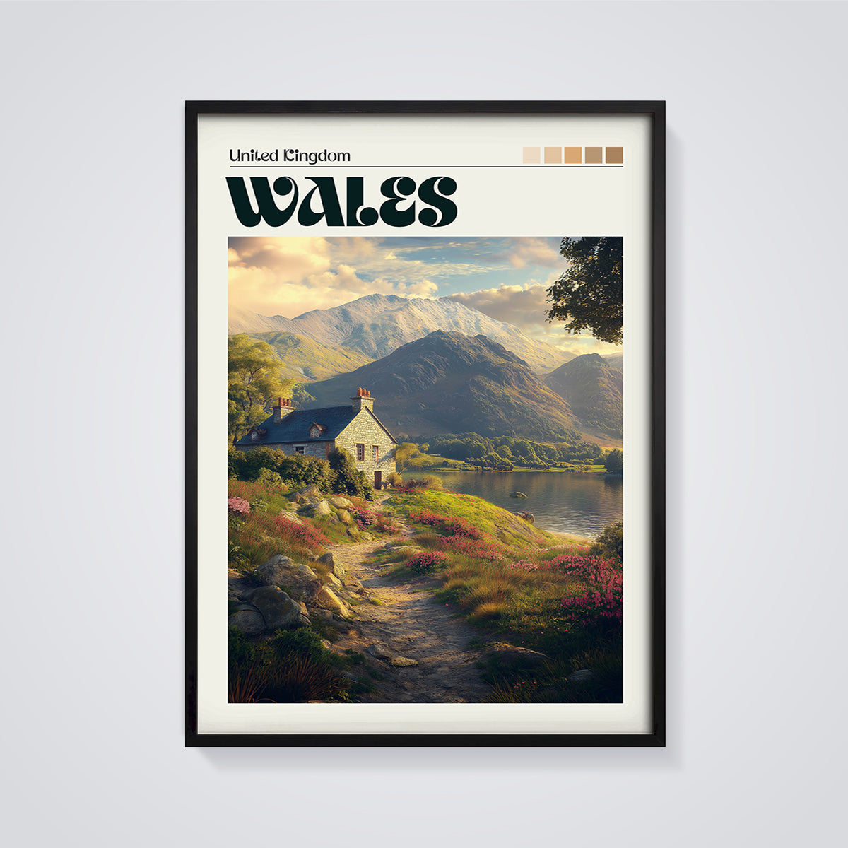 Wales Mountain Lake Cottage Print framed in black on a grey background