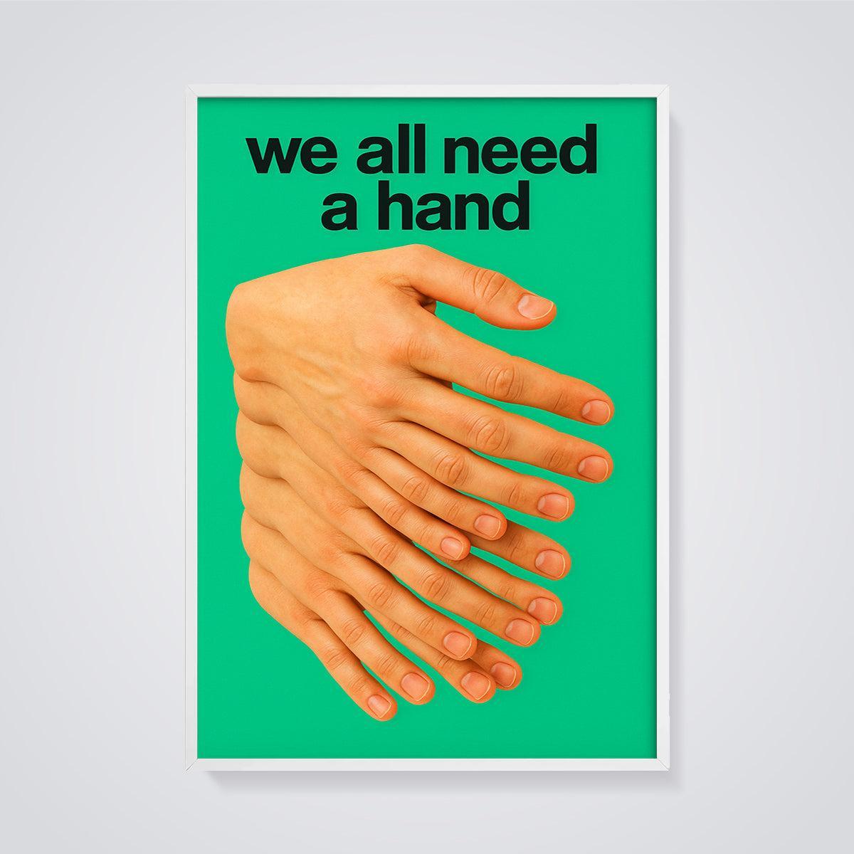 We All Need a Hand Hands Print framed in white on a grey background