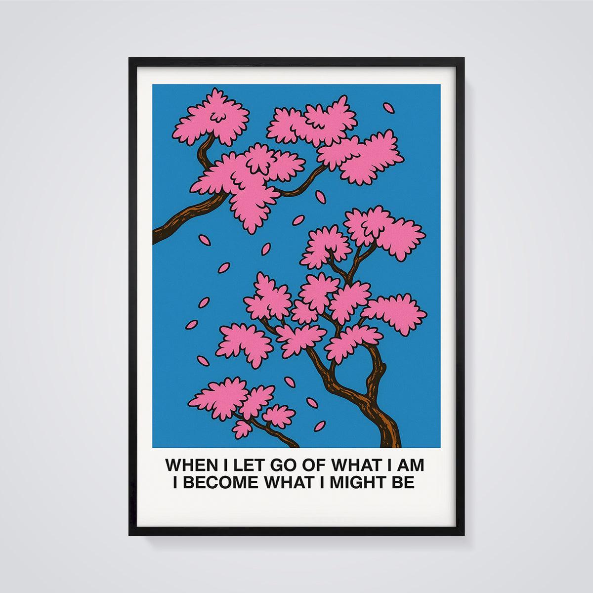 When I Let Go Cherry Blossom Print framed in black on a grey background