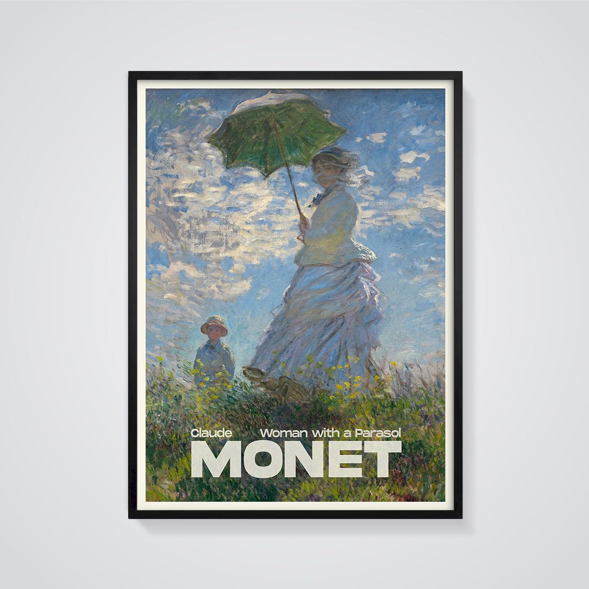 Woman with a Parasol Monet Print framed in black on a grey background