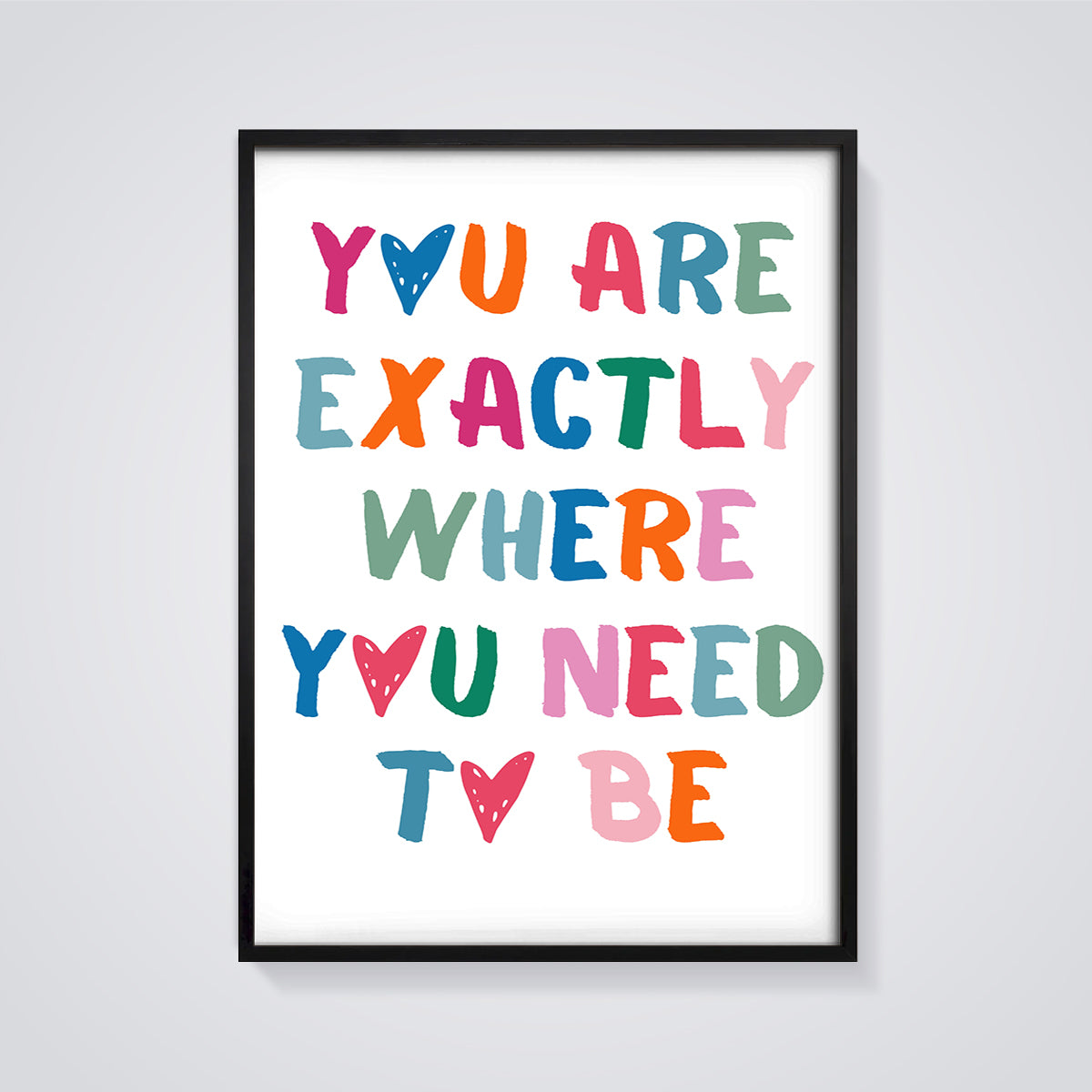 You Are Exactly Where You Need To Be Print framed in black on a grey background