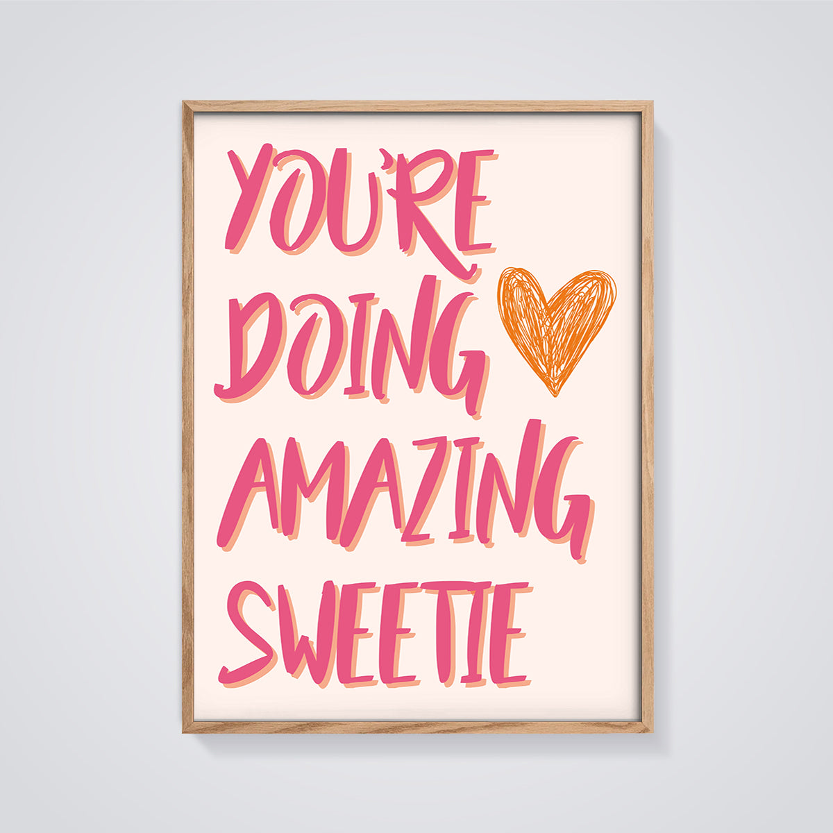 You're Doing Amazing Sweetie Print framed in oak on a grey background