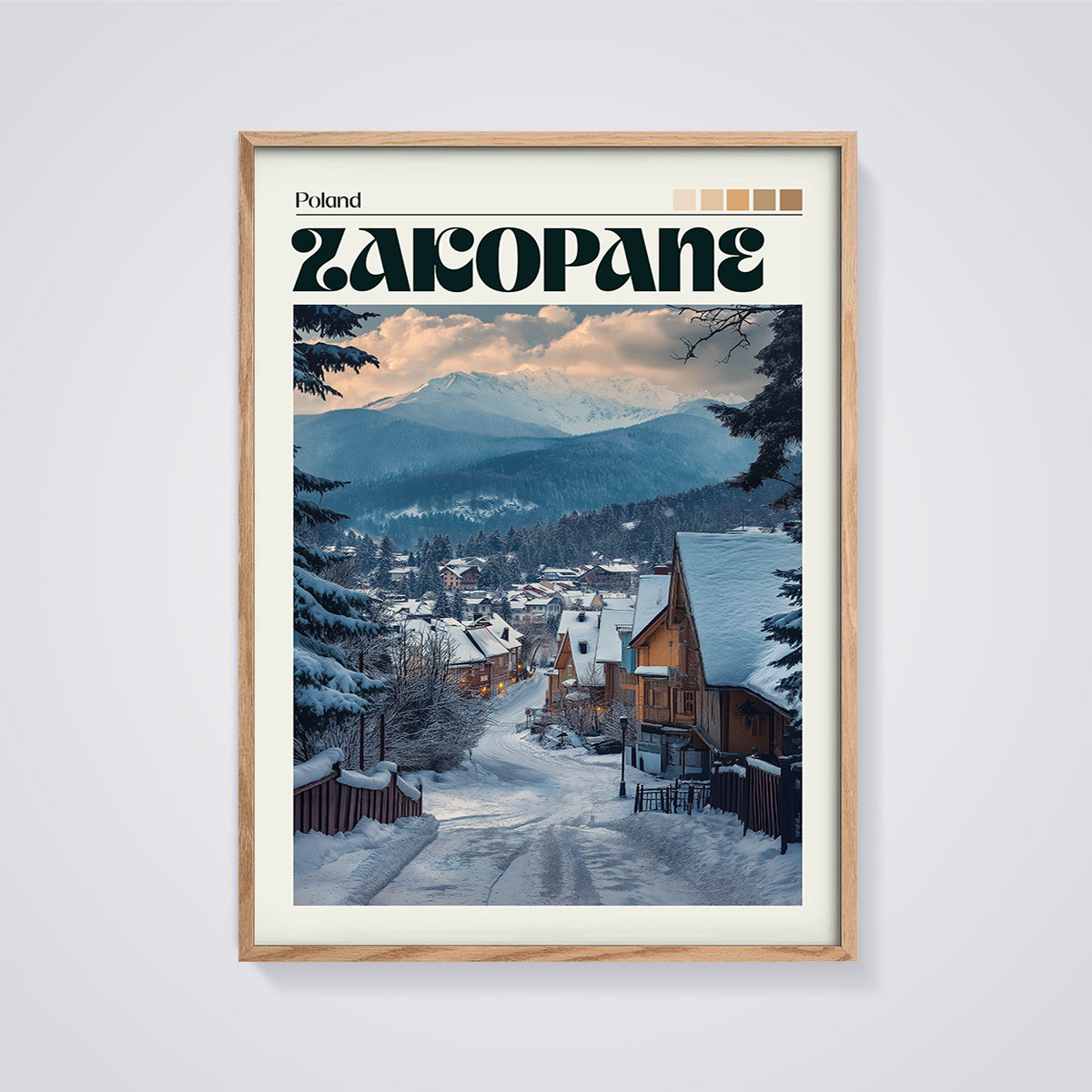 Zakopane Winter Village Print framed in oak on a grey background